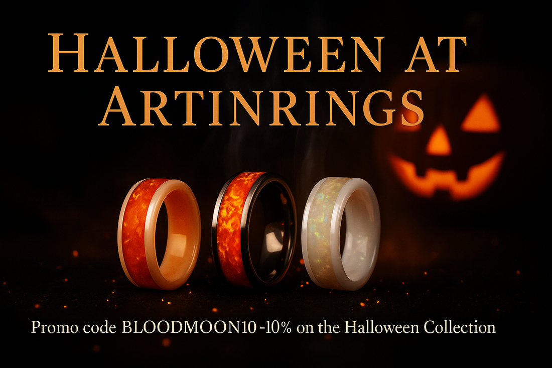 Drei handgefertigte Ringe vor einem leuchtenden Kürbis – Artinrings Halloween-Kollektion 2025