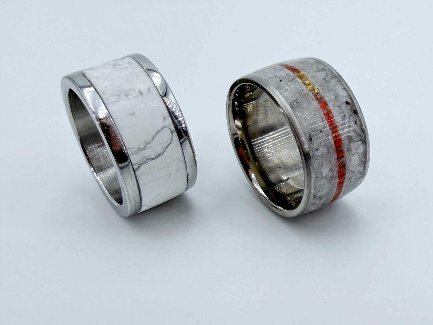 Diptych of two contemporary ring sculptures titled “Non Nobis,” displayed side by side, exploring contrast between purity and violence.